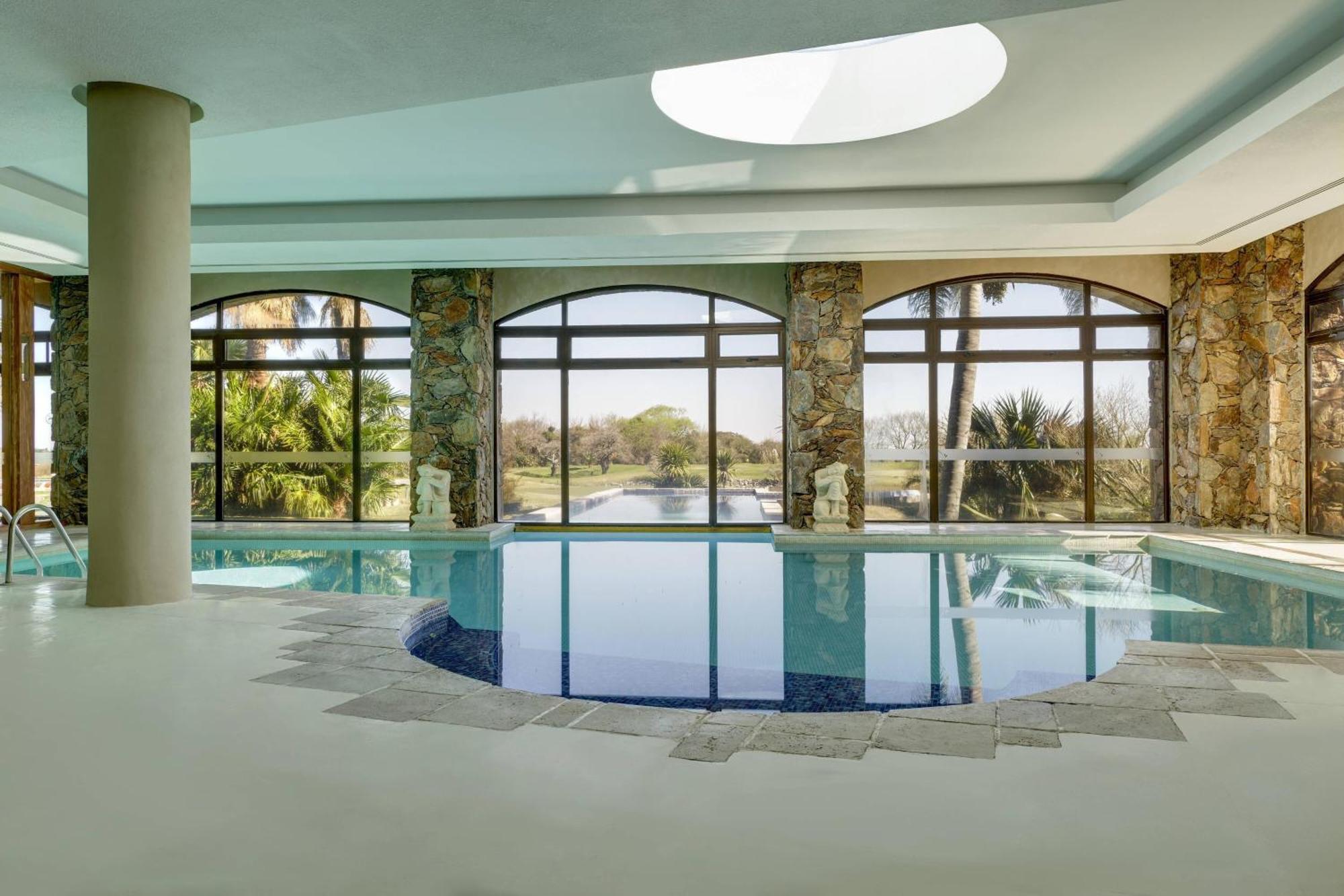 Sheraton Colonia Golf & Spa Resort Colonia del Sacramento Eksteriør billede The swimming pool at the hotel
